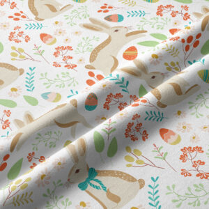 Szczegółowy zbliżenie na tkaninę bieżnika pokazujące zajączka, pisanki i delikatną fakturę materiału