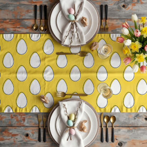 Aranżacja stołu z bieżnikiem, talerzami, serwetkami i wiosennymi kwiatami w dekoracji wielkanocnej