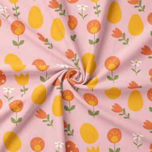 zbliżenie na wzór obrusa z pisankami i tulipanami pokazujące detal tkaniny