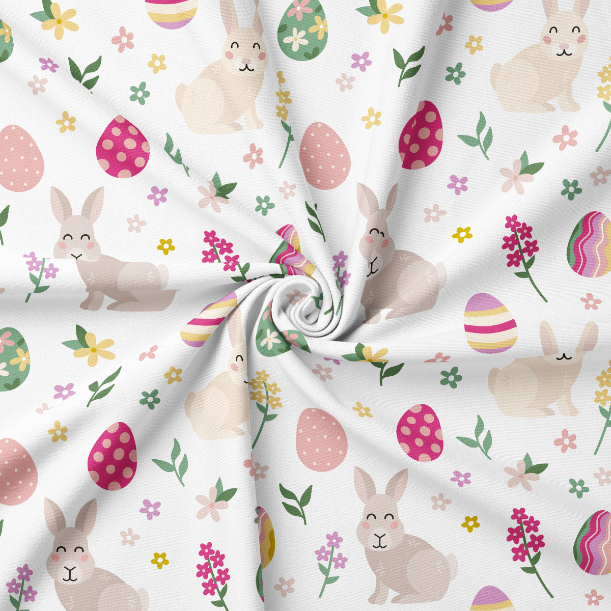 Zbliżenie na tkaninę pokazujące delikatne króliczki, kolorowe pisanki i drobne kwiatki