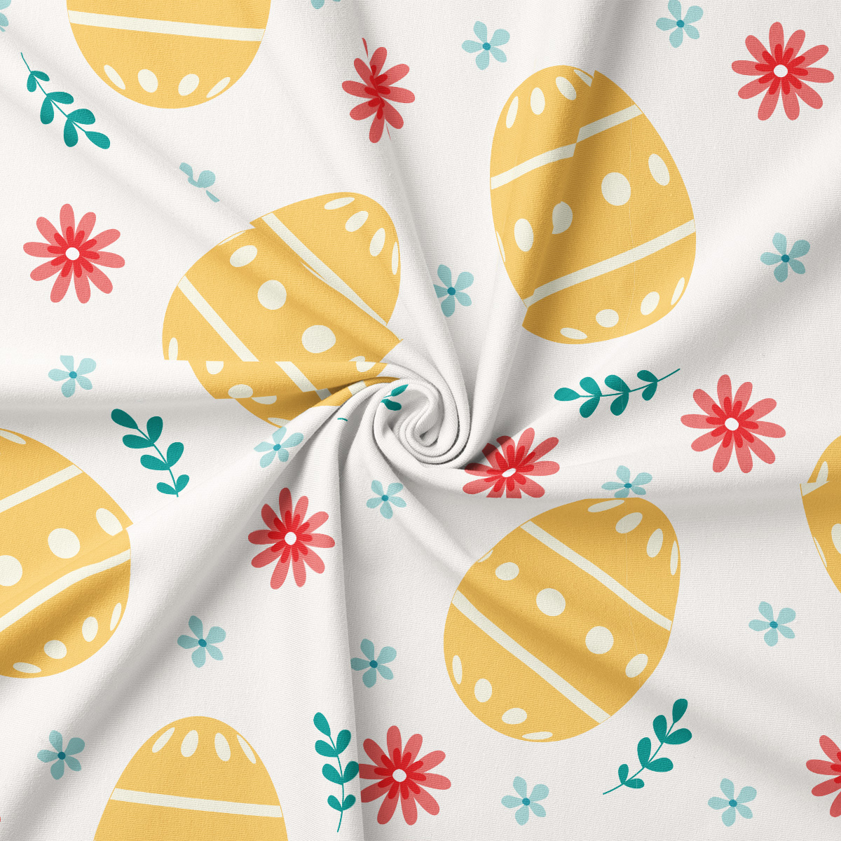 Zbliżenie na tkaninę z motywem pisanek i drobnych kwiatków, pokazujące fakturę materiału