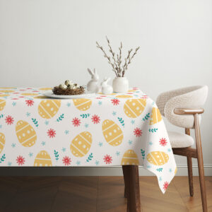 Aranżacja stołu z krzesłem i dekoracjami, obrus w wiosenne pisanki w jasnym wnętrzu