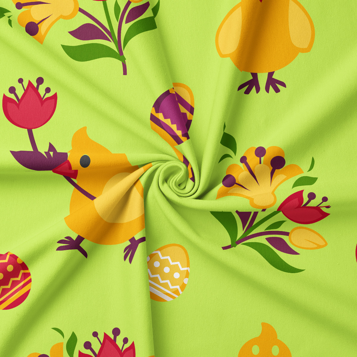 Zbliżenie materiału pokazujące detal nadruku kurczaczka, pisanki i kwiatów na jasnozielonym tle