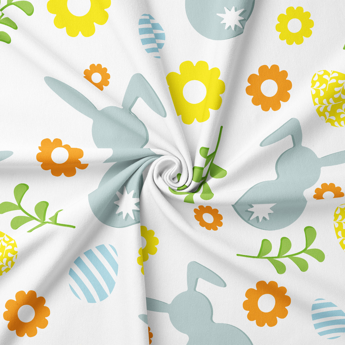 Zbliżenie na tkaninę ukazujące detale zajączków, pisanek i kwiatów w pastelowych kolorach