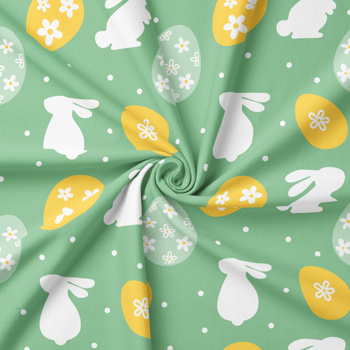 Zbliżenie na wzór z białymi sylwetkami zajączków, żółtymi i jasnymi pisankami oraz drobnymi kropeczkami