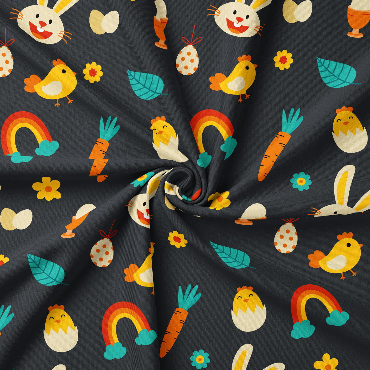 Zbliżenie na tkaninę z wzorem: uśmiechnięte zajączki, kurczątka, marchewki i tęcze