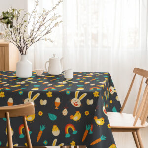 Przytulna jadalnia z obrusem ozdobionym wiosennymi symbolami i wazonem z gałązkami