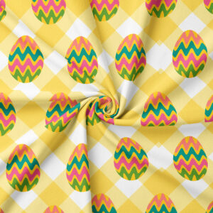 Zbliżenie na fakturę tkaniny i powtarzające się motywy pisanek