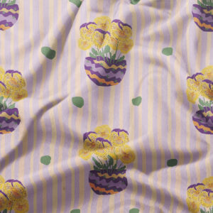 Zbliżenie na tkaninę z powtarzającym się wzorem doniczek z bratkami i zielonymi kropeczkami