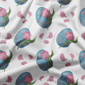 zbliżenie tkaniny pokazujące szczegóły wzoru pisanek, tulipanów i rozsypanych płatków