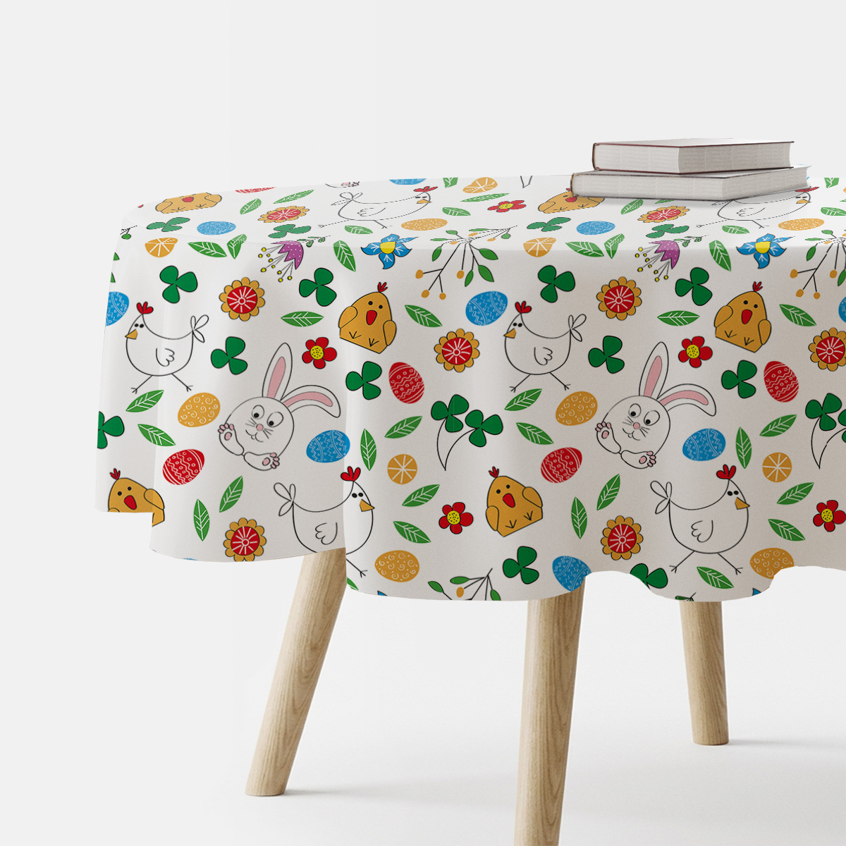 Okrągły obrus z wielkanocnym wzorem króliczków, kurczaczków i pisanek - główne ujęcie stołu