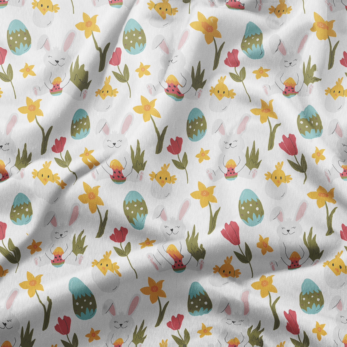 Zbliżenie na detale wzoru z zajączkami, pisankami, kurczaczkami i wiosennymi kwiatami w pastelowych kolorach