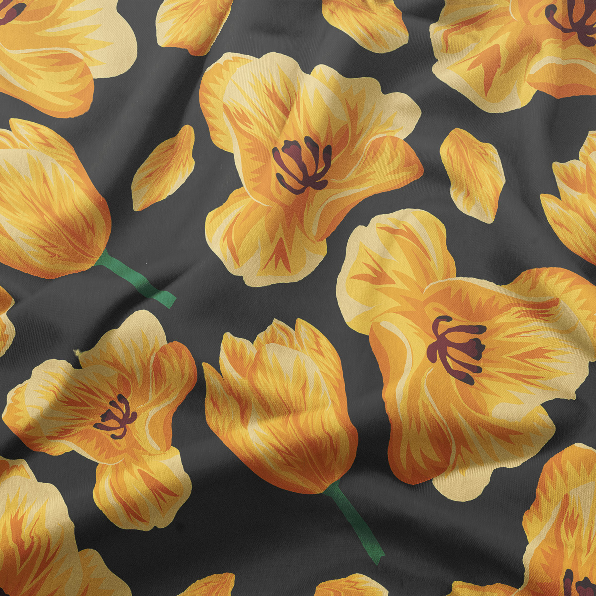 zbliżenie na wzór i fakturę tkaniny z żółtymi tulipanami na ciemnym tle
