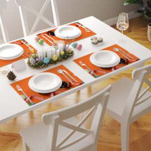 Widok jadalni z kilkoma podkładkami ułożonymi na białym stole, stonowana aranżacja świąteczna