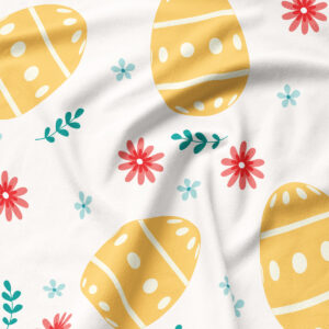 Zbliżenie na wzór z żółtą pisanką, czerwonym kwiatem i zieloną gałązką na jasnej tkaninie