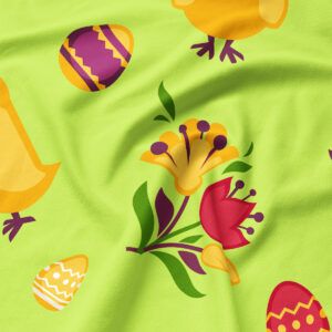 Zbliżenie na detale wzoru pokazujące pisanki, kwiaty i fakturę tkaniny