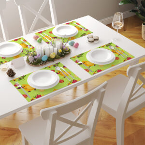 Widok stołu z kilkoma podkładkami w komplecie tworzącymi wielkanocną dekorację