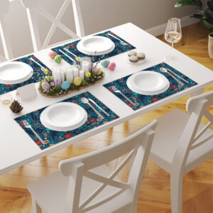 Aranżacja stołu z kilkoma podkładkami w tym samym wzorze tworząca wielkanocne nakrycie