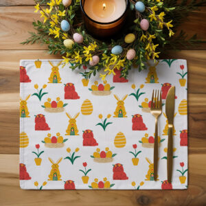 Aranżacja stołu z pojedynczą podkładką pod dekoracyjnym stroikiem i świecą, wiosenny motyw wielkanocny