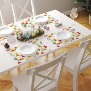 Widok stołu z kilkoma podkładkami ustawionymi przy nakryciach, talerze i sztućce tworzą spójną świąteczną aranżację