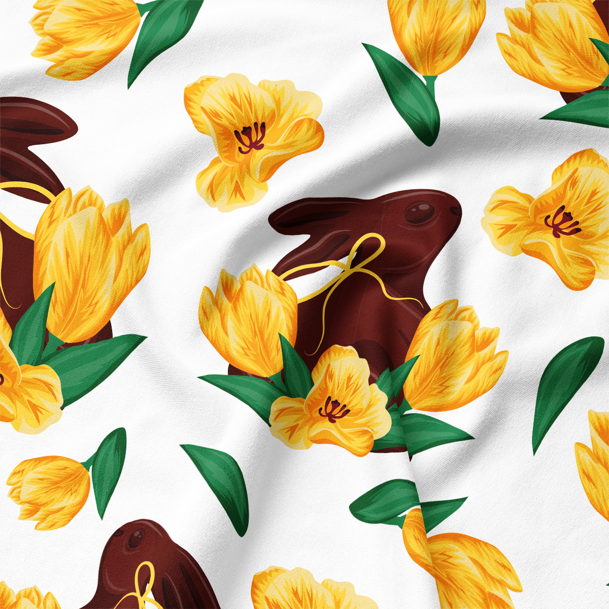 Zbliżenie na detal wzoru pokazujące czekoladowego zająca z kokardką i żółte tulipany