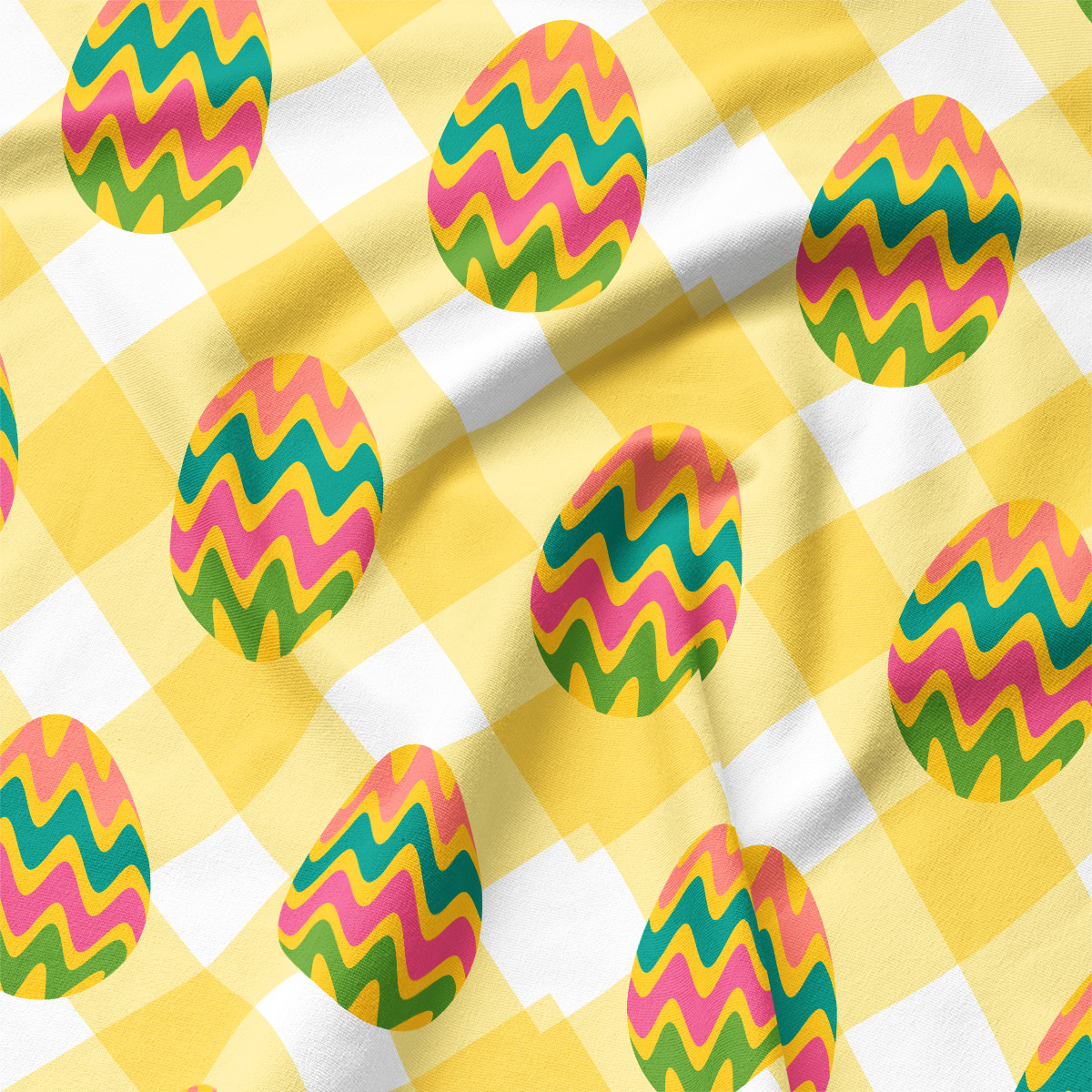 Zbliżenie na nadruk pokazujące kolorowe pisanki na tle żółtej kraty