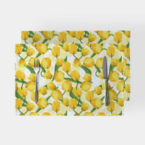 Widok z góry dwóch podkładek z motywem żółtych tulipanów na białym tle, ujęcie produktowe