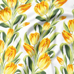 Zbliżenie na tkaninę z rysunkowym motywem żółtych tulipanów i zielonych liści pokazujące fakturę materiału