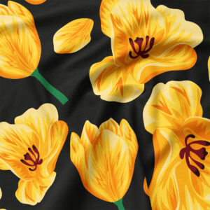 Zbliżenie na tkaninę z detalami żółtych tulipanów i fakturą materiału