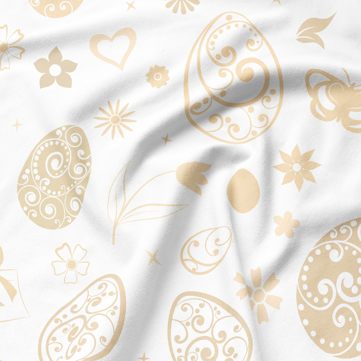 Zbliżenie na delikatny druk kremowych wzorów jajek, kwiatów i ornamentów na tkaninie