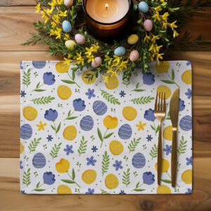 Aranżacja świątecznego stołu z podkładkami i dekoracyjnym wieńcem z jajkami