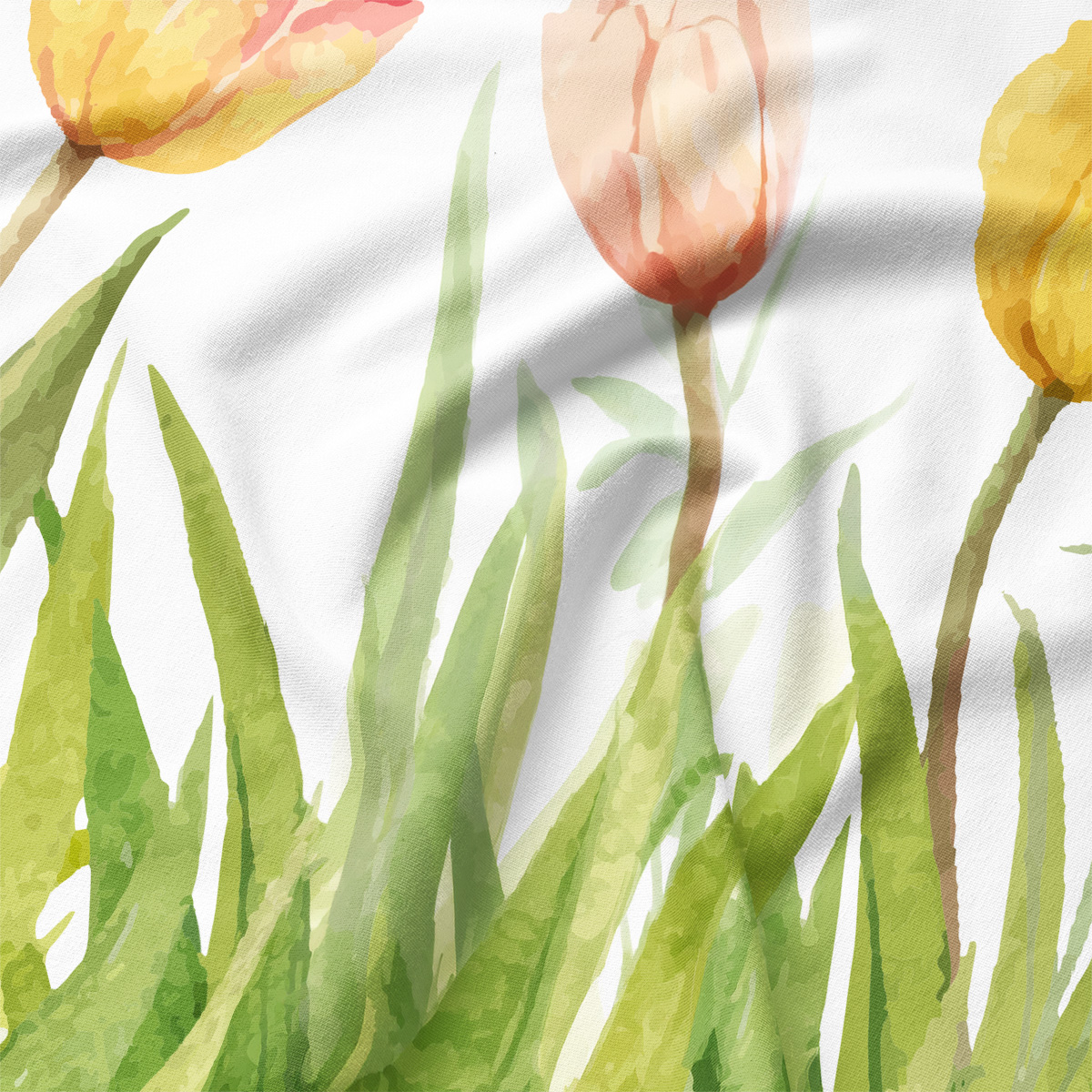 Zbliżenie na fakturę materiału i detal akwarelowych tulipanów oraz zielonej trawy