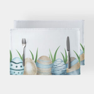 Podkładka z akwarelowymi pisankami i zieloną trawą na białym tle, widok z przodu