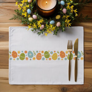 Aranżacja stołu z podkładką obok świecy i wiosennego wieńca, stylowa dekoracja świąteczna