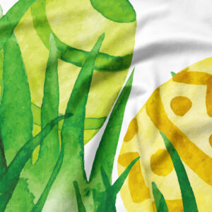 Zbliżenie na fakturę tkaniny i detale akwarelowego wzoru z zielenią i żółcią