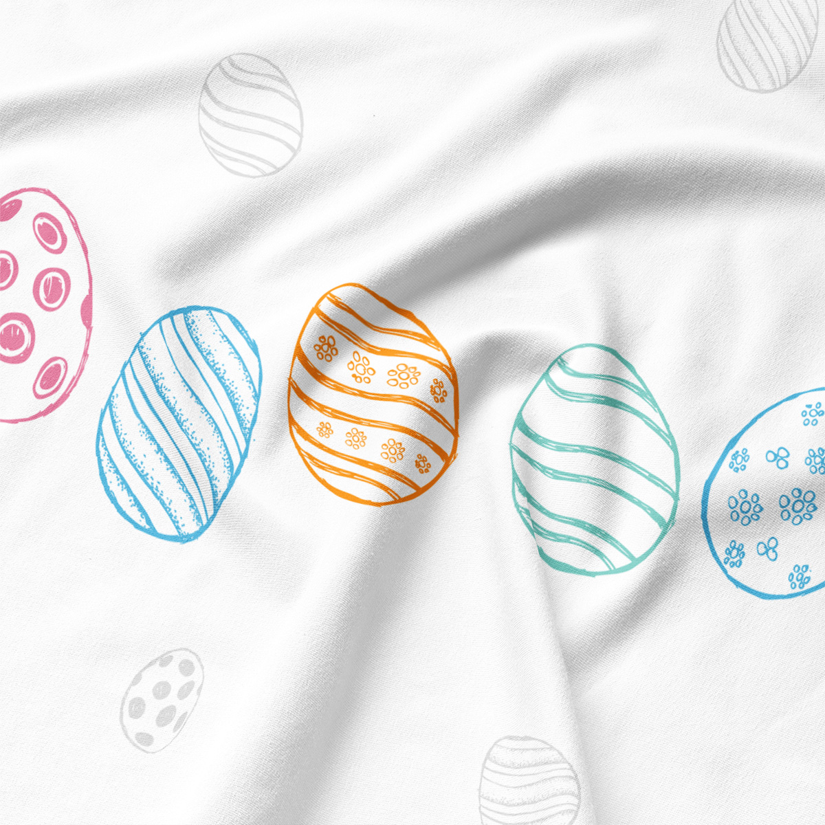 zbliżenie na kolorowe wzory pisanek drukowane na materiale podkładki