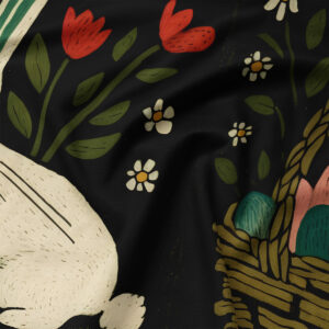 Zbliżenie na fakturę tkaniny i detal ilustracji: koszyk z pisankami, drobne kwiaty i liście