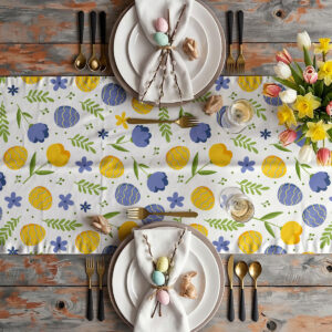 Aranżacja stołu z bieżnikiem, talerzami i wiosennymi dekoracjami