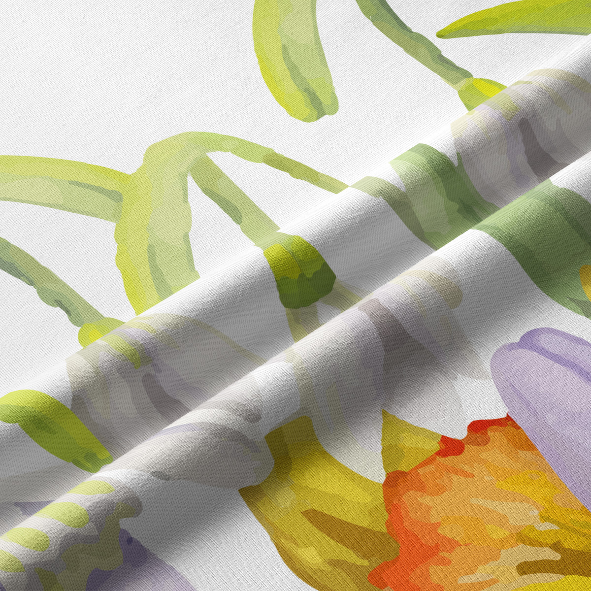 Zbliżenie na fakturę tkaniny i detal druku z zielonymi łodygami i pastelowymi płatkami