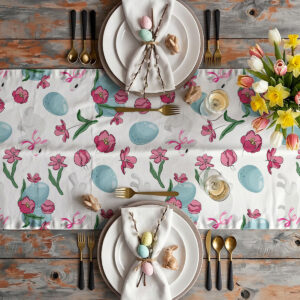 Widok aranżacji stołu z bieżnikiem, talerzami i wiosennymi dekoracjami