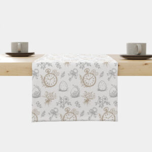 Bieżnik z wzorem zegarków, pisanek i bukiecików ułożony na drewnianym stole