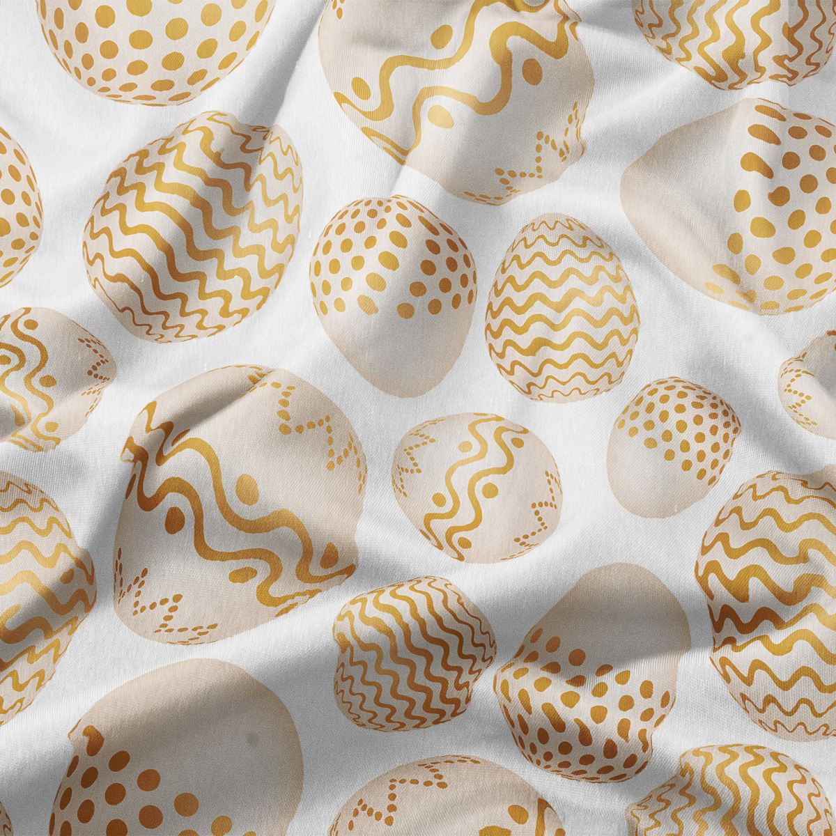 zbliżenie na tkaninę i detale złotego nadruku pisanek