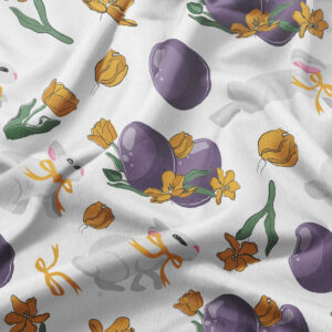 detal tkaniny z fioletowymi pisankami, żółtymi tulipanami i subtelnym motywem zajączków