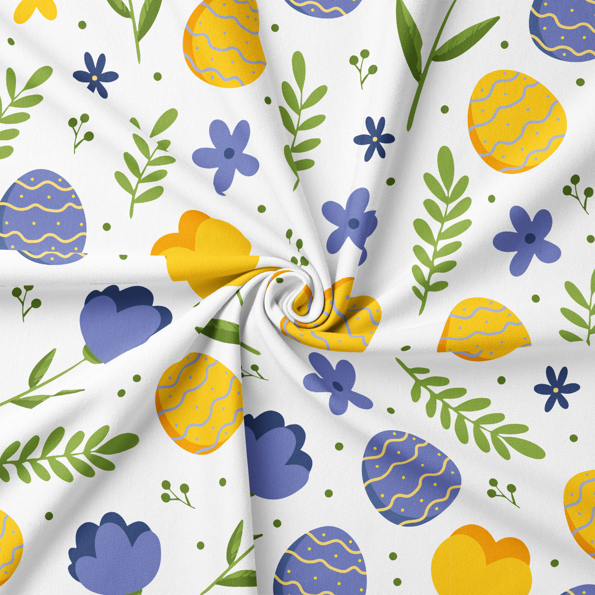 Zbliżenie na tkaninę z wzorem pisanek, tulipanów i zielonych gałązek