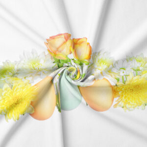 Zbliżenie na nadruk z pastelowymi jajkami, żółtymi chryzantemami i delikatnymi różami