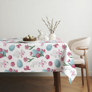 aranżacja stołu w jasnym wnętrzu z dekoracjami i obrusie w wiosenny wzór