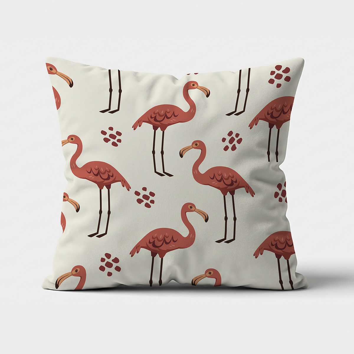 Poduszka dekoracyjna z motywem różowych flamingów na kremowym tle, widok z przodu