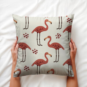 Zbliżenie na grafikę flamingów i fakturę materiału poduszki