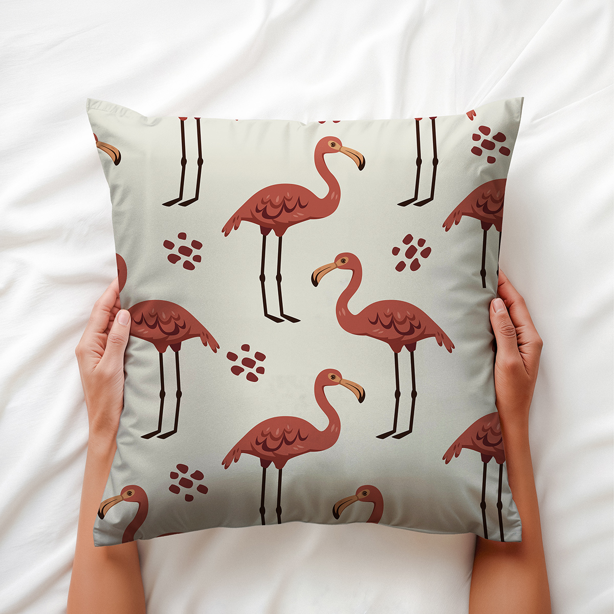 Zbliżenie na grafikę flamingów i fakturę materiału poduszki