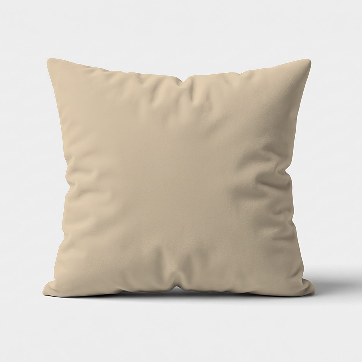 Główne ujęcie beżowej poduszki dekoracyjnej na jasnym tle